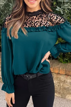 Blusa elegante con volant, petrolio