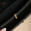 Borsa piccola con stampa pelle di coccodrillo, nera