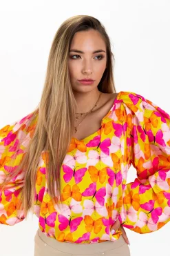 CAMICIA ELEGANTE CON MANICHE LUNGHE, TAGLIO PROFONDO E FARFALLE STAMPATE MULTICOLOR ANDREYA, GIALLO