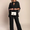 Completo elegante composto da tunica nera e pantaloni lunghi.