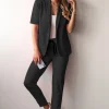 Completo giacca e pantaloni a maniche corte, nero