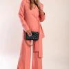 Completo giacca e pantaloni eleganti, colore salmone