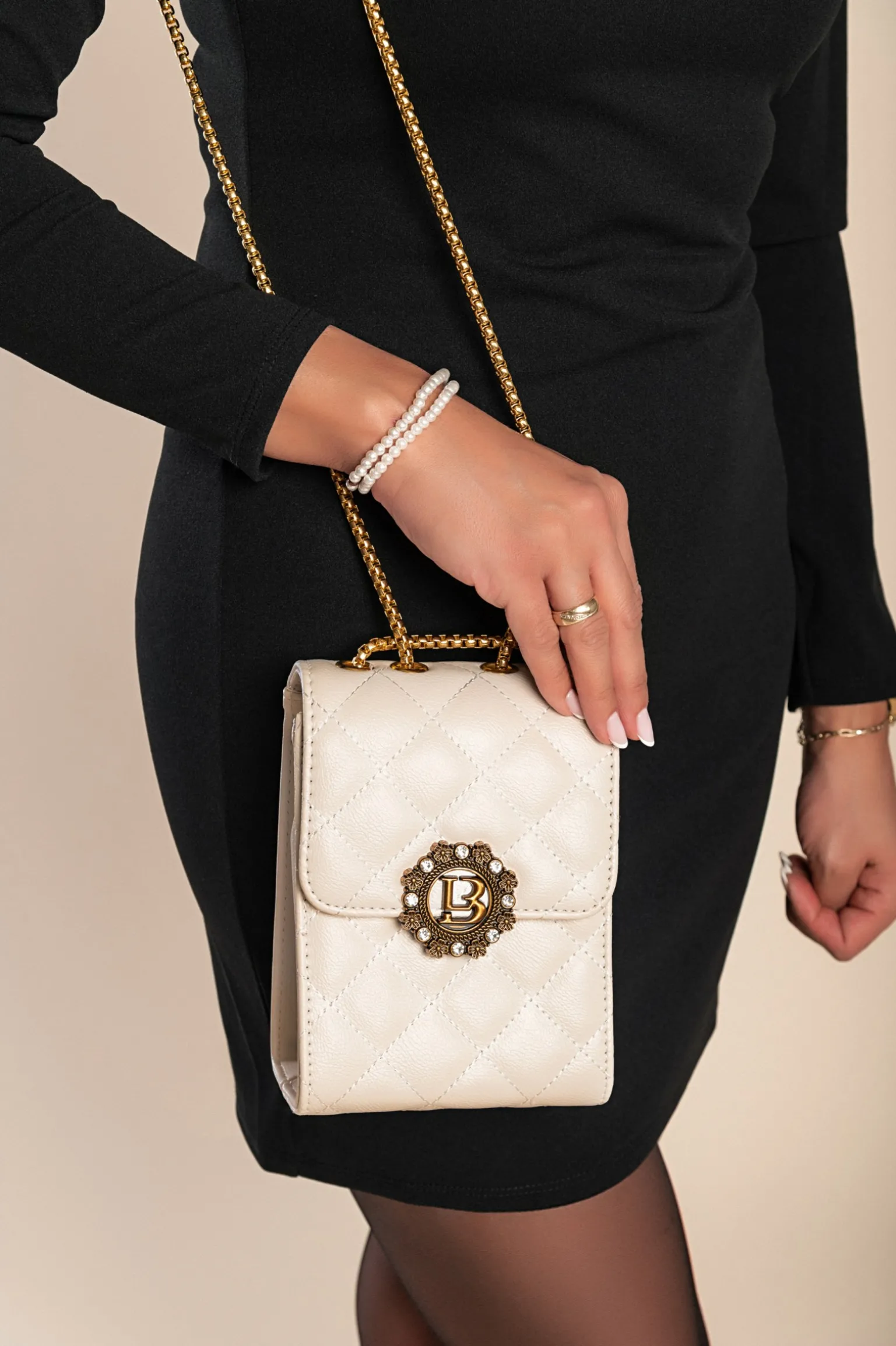 Elegante borsa a mano piccola con dettaglio trapuntato, bianca