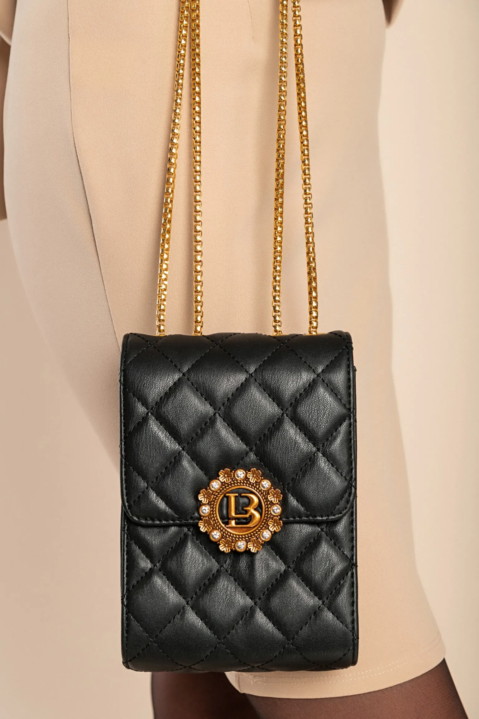 Elegante borsa a mano piccola con dettaglio trapuntato, nera