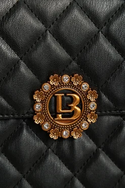 Elegante borsa a mano piccola con dettaglio trapuntato, nera