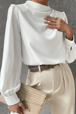 Elegante camicetta a collo alto, bianca