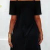 Elegante mini abito con maniche corte, spalle scoperte e spalline  Cecina, nero