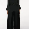 Elegante tuta con paillettes, nera
